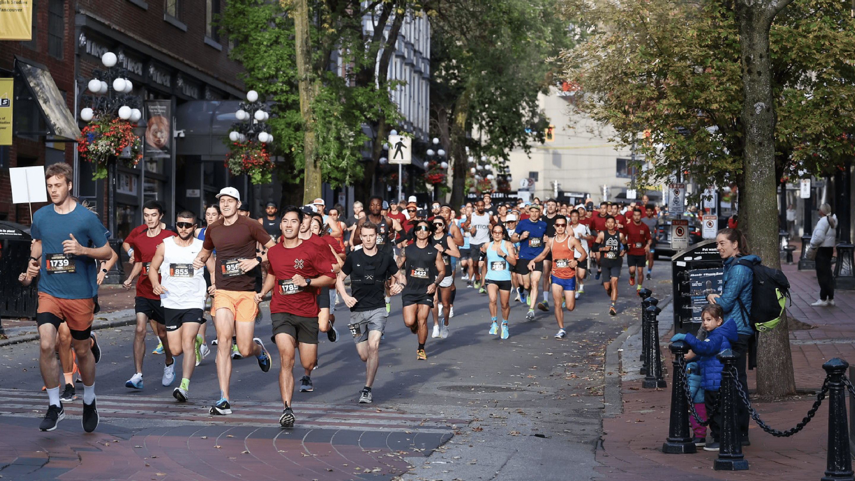 Competitors running through Gastown in Vancouver